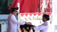 Pimpin Upacara HUT RI ke-80, Pj Gubernur Fatoni Ajak Masyarakat Papua Rawat Kondusifitas